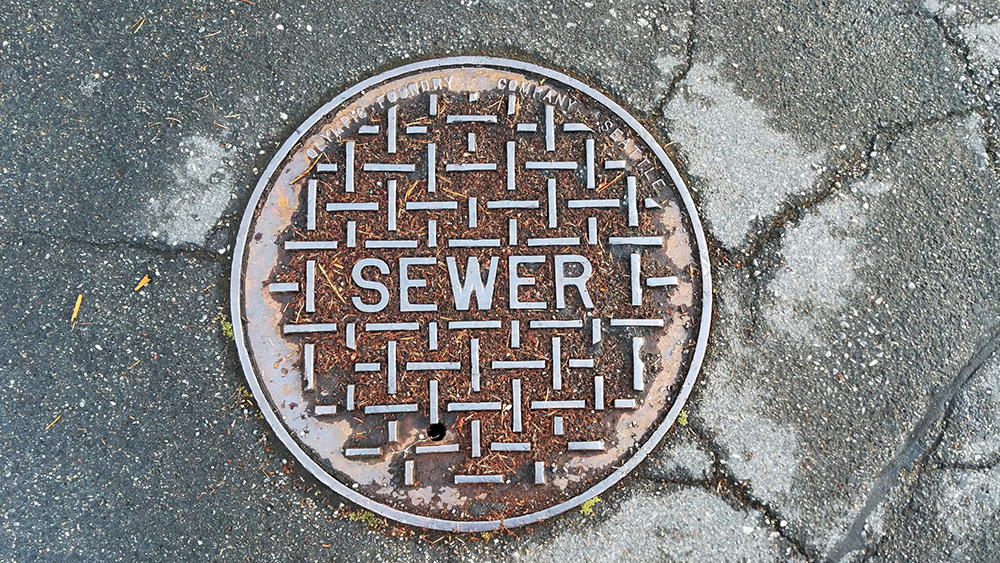 Sewer lid on the street