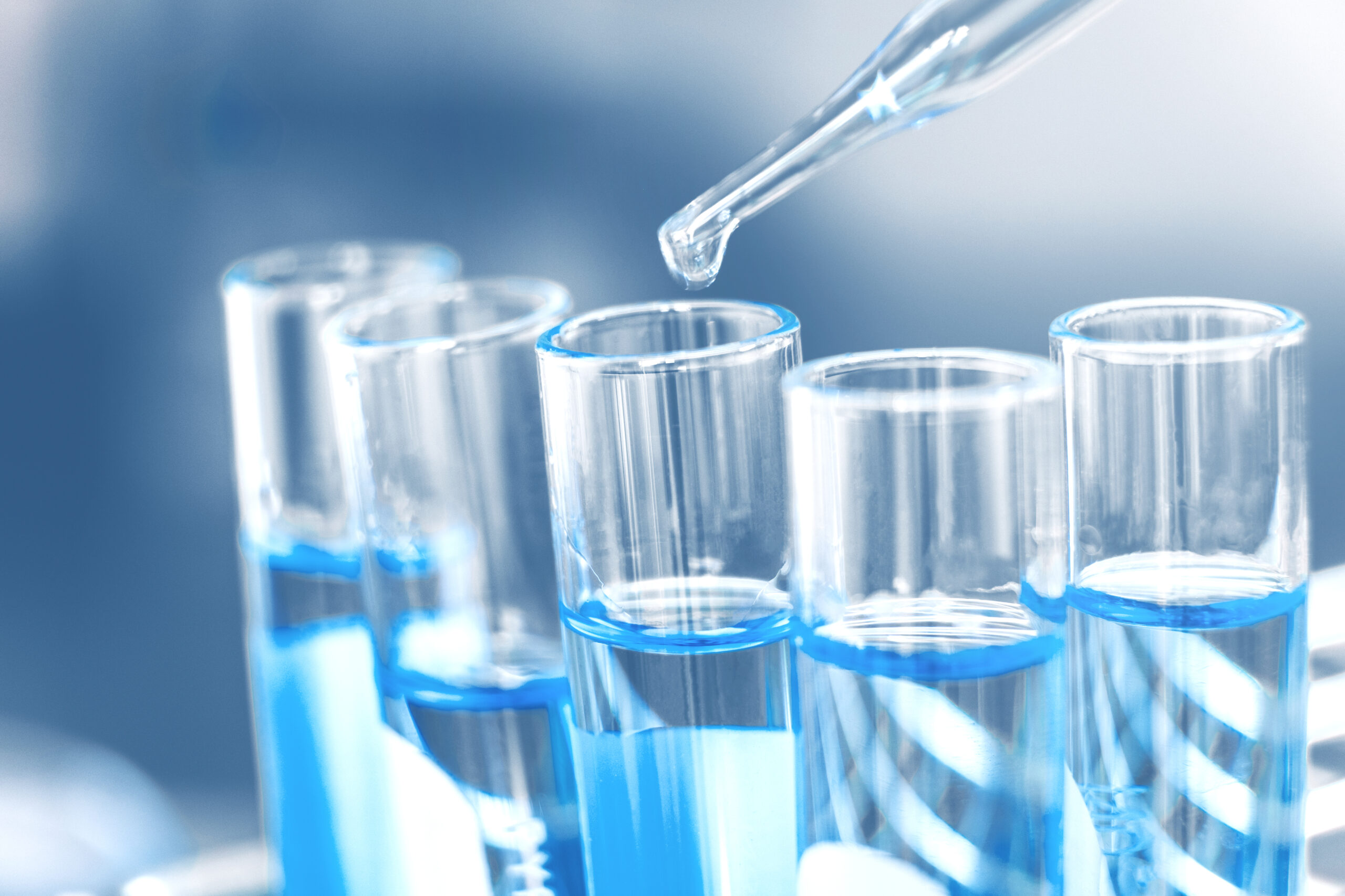 Light blue test tubes almost full